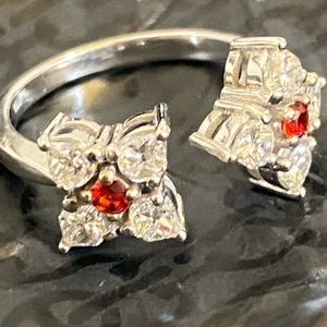 Stunning Diamond and Orange Sapphire “Et Moi” ring set in 18k gold.